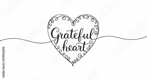 Elegant hand-drawn heart with the words Grateful Heart artfully written inside.