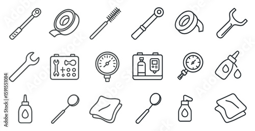 Collection of tools and items, including a wrench, a screwdriver, and a pair of pliers
