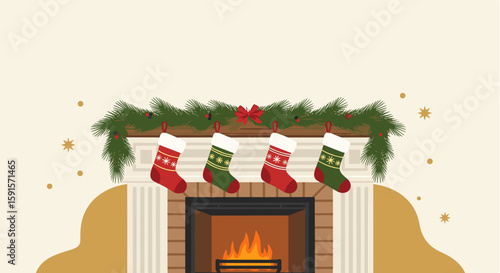 Christmas stockings hanging on fireplace mantel with garland decoration  