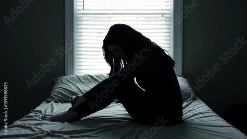 Sadness in a bedroom