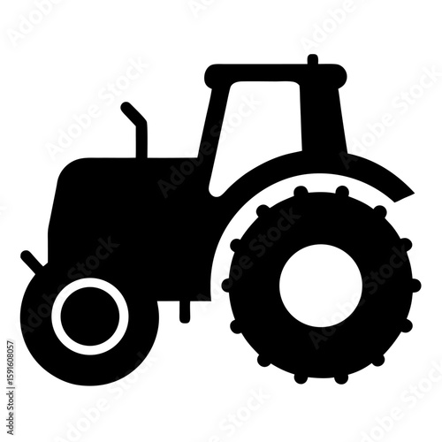 Black silhouette of a farm tractor with large wheels for agricultural use