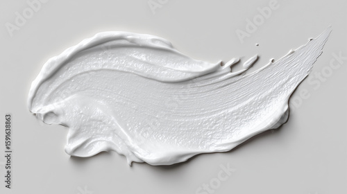 濃密な白いクリームを塗り広げた質感。機能性と清潔感を強調した美容・スキンケア用素材。
