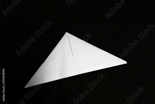 Origami Triangle Paper on Black Background