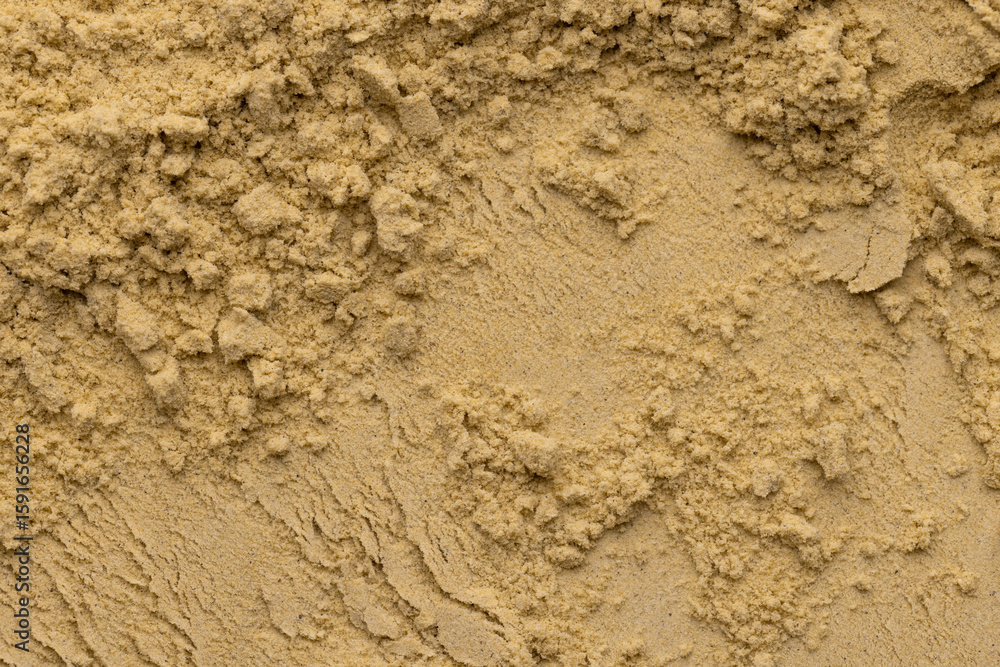 Dry mustard powder (sand) as a background or texture. Dry mustard powder (sand) as a background or texture.