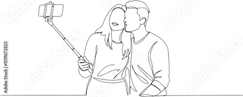 Selfie stick couple. Couple taking a selfie while kissing with a smartphone on stick  