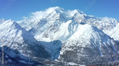 Wallpaper Mural Snowy mountain peaks under a clear sky Torontodigital.ca