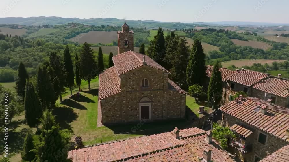 Picturesque Italian village church with rolling hills Picturesque Italian village church with rolling hills
