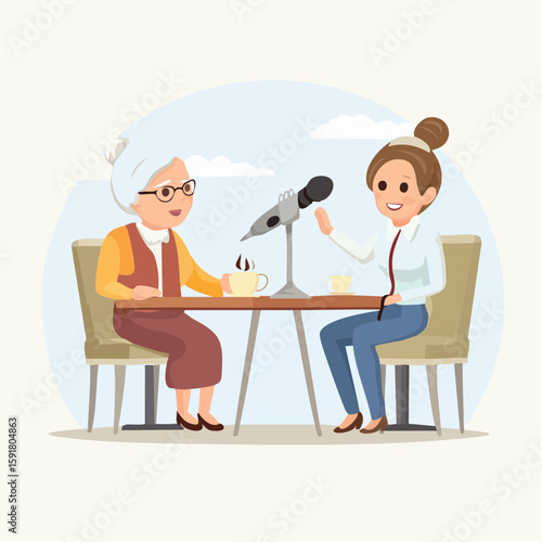 An older woman with glasses and a younger woman are recording a podcast at a table.