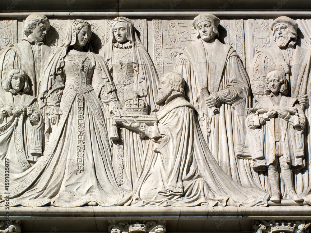 Fototapeta premium Coronation of a queen from the frieze of the Supreme Court, formerly the Middlesex Guildhall in Parliament Square Westminster London England UK, travel destination stock photo image