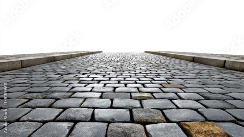 A cobblestone path ascends towards a bright white sky creating a sense of journey and open possibility