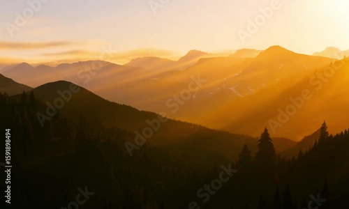 A looping video of a serene mountain landscape at golden hour