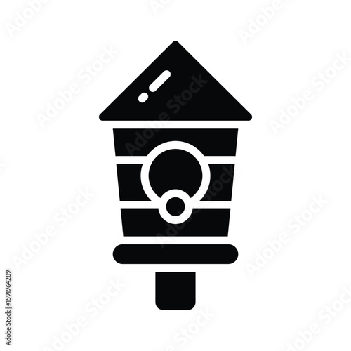 A charming glyph icon of small wooden birdhouse