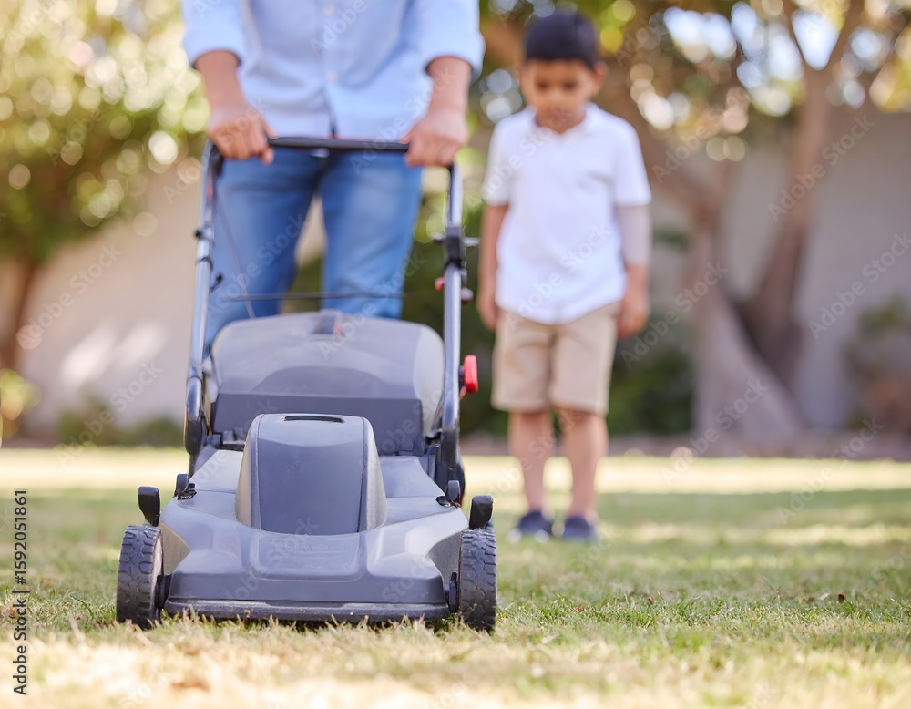Fototapeta premium Father and Son Mowing Lawn Scene