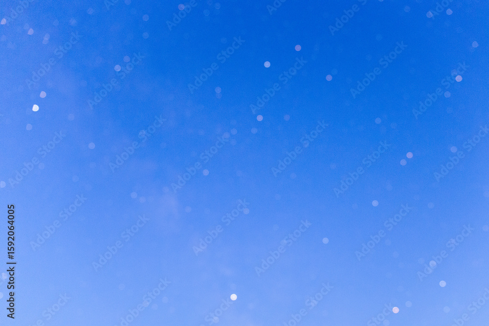 Fototapeta premium Abstract Dreamlike Blue Bokeh Light Background For Creative Designs