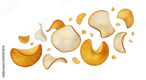 Crisp cassava chips float gracefully, showcasing their golden and pale hues against the backdrop.