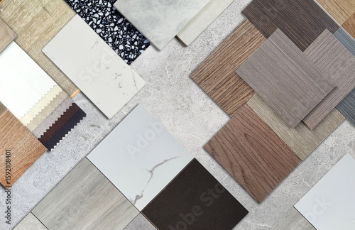 Fotografía Diverse interior design material samples: wood veneer, laminate, marble, stone tile, terrazzo, fabric, artificial stone swatches placed on grey marble stone background