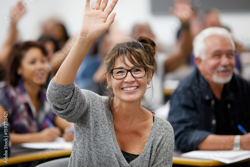 Student raising hand in adult literacy class, multicultural setting, positive atmosphere, 