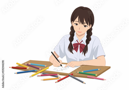 Young girl artist drawing and coloring with pencils at a desk