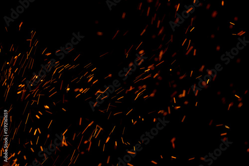 A black background with a lot of orange sparks