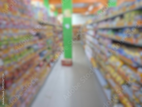 Wallpaper Mural Blurry image of a supermarket aisle with shelves full of products. An abstract retail background for business, shopping, supermarket concepts, or consumer markets. Torontodigital.ca
