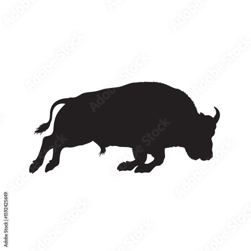 Dramatic Silhouette of a Charging Bison with Horns and Energetic Movement