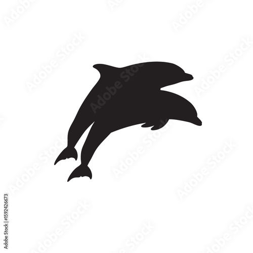 Two dolphins playfully leaping out of the water in a black silhouette
