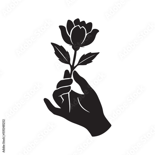 Hand  holding a blooming flower design 