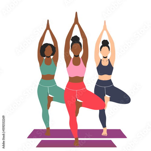 Three women doing the tree pose in yoga