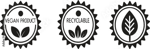 Three oval badges with vegan and recyclable symbols silhouette