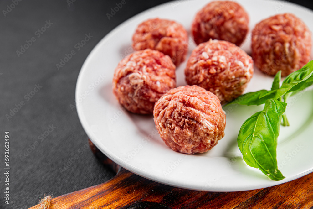 Meatballs raw meat pork, beef, chicken fresh delicious gourmet food background on the table rustic food top view copy space Meatballs raw meat pork, beef, chicken fresh delicious gourmet food background on the table rustic food top view copy space