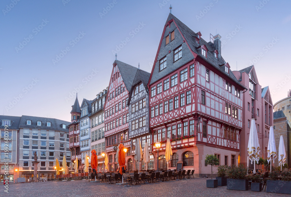 Naklejka premium The historic Romer building at dawn in Romerberg Square in Frankfurt am Main Germany