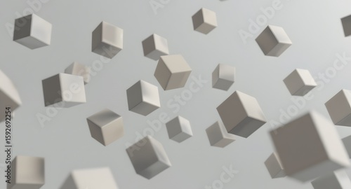 Abstract composition of floating cube shapes in a neutral gray environment with soft lighting creating a sense of depth and modern aesthetic.