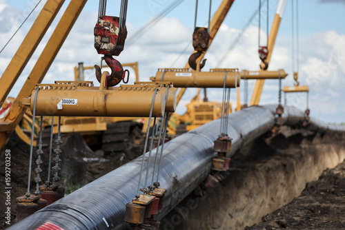 Installation of a huge industrial gas pipe line on a field