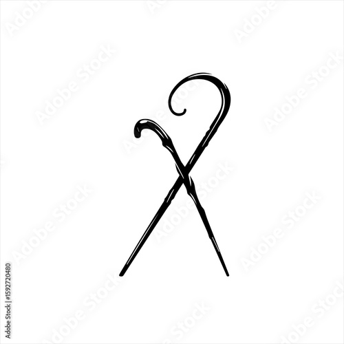 Two vintage walking canes crossed isolated on white background