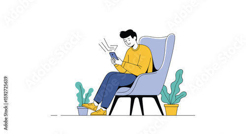 Young man sitting in comfortable chair reading book enjoying relaxing moment at home