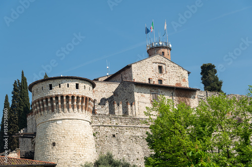 View to the Castle of Brescia (Castello di Brescia) from outside. Clear sunny day with blue sky
