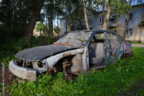 An old car after an accident, parked in the yard