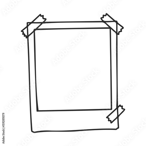Blank polaroid frame with tape on white background