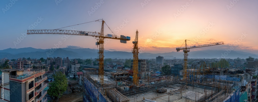 Obraz premium Cityscape Construction Site at Dawn