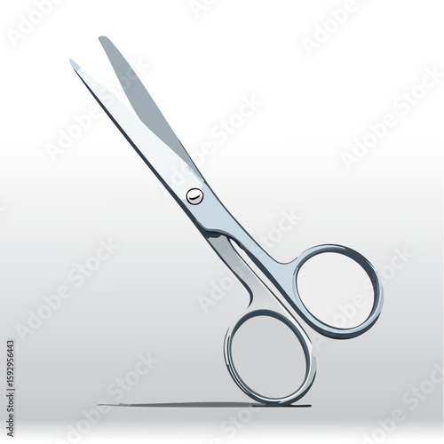 Scissors with open blades – Stainless steel scissors resting open on a table.

