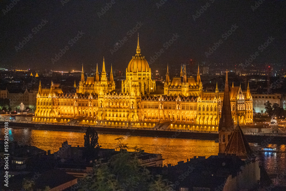 Obraz premium Budapest, Hungary - July 7, 2025: View of the city landmarks. Hungarian Parliament Building.