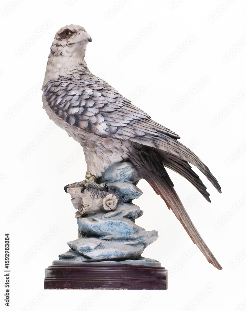 Fototapeta premium ceramic eagle figurine isolated on white background