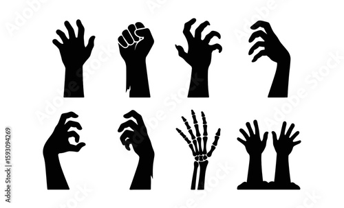 Silhouette of various zombie and skeleton hands reaching and grasping in different poses