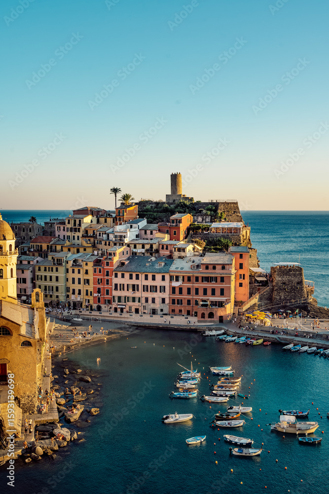 Fototapeta premium Vernazza's multi-colored facade at sunset 