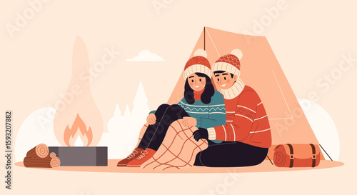 Cozy Winter Camping Couple Enjoying Firelight And Togetherness In Nature
