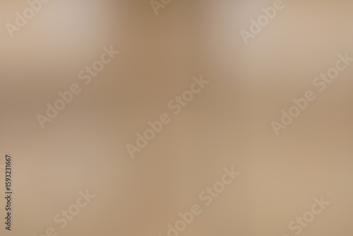 Foto Creme beige als ruhiger reiner Hintergrund und backdrop mit Verlauf