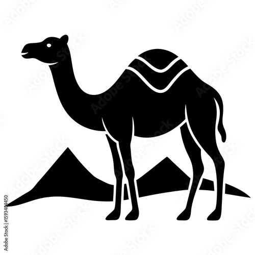 Black silhouette of a camel standing in the desert with mountains
