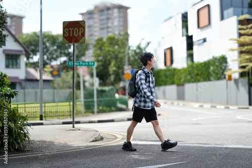 Wallpaper Mural young man walking scene in pedestrians in the city environment Torontodigital.ca