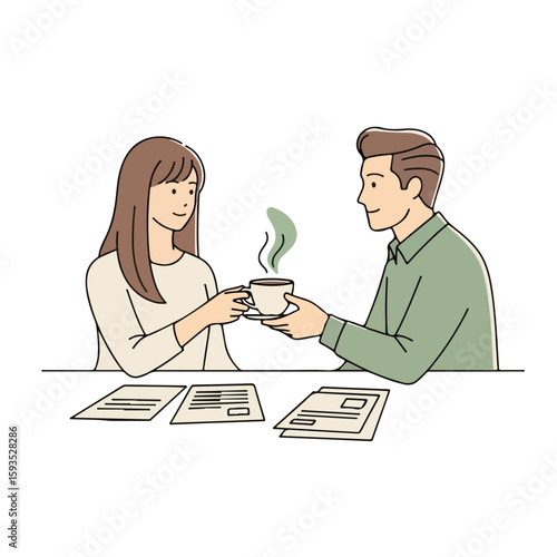 Young couple sharing coffee while discussing documents at table  