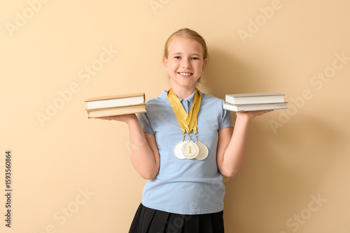Cute little schoolgirl with...